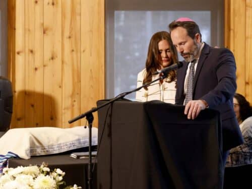 Meredith Marks and her husband, Seth, speak at Meredith's bat mitzvah in Park City, in an episode of "The Real Housewives of Salt Lake City." (Fred Hayes | Bravo)