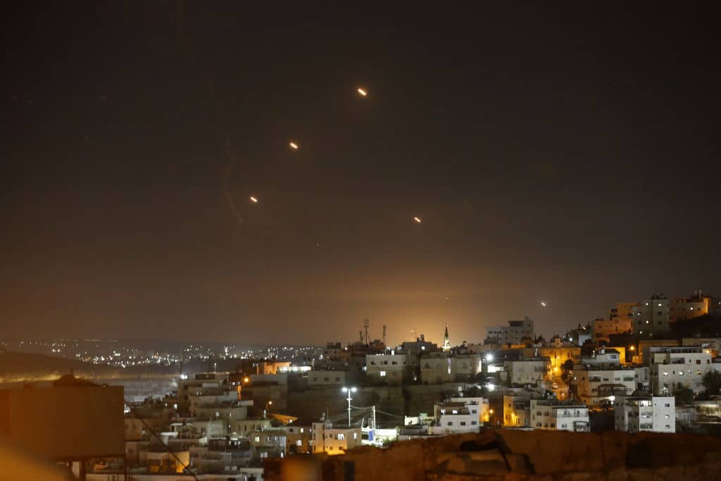 HEBRON, WEST BANK - OCTOBER 01: Many rockets, fired from Iran, are seen over Jerusalem from Hebron, West Bank on October 01, 2024. The Israeli army announced that missiles were fired from Iran towards Israel and sirens were heard across the country, especially in Tel Aviv. (Photo by Wisam Hashlamoun/Anadolu via Getty Images)