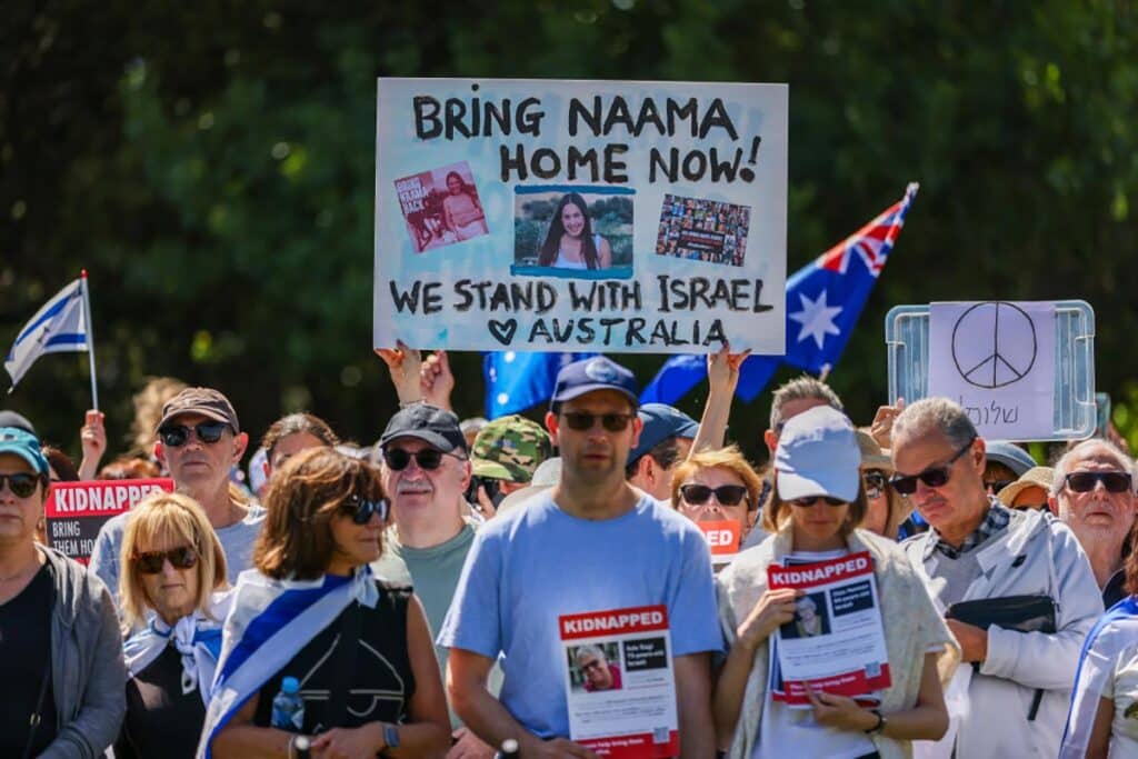 Supporters of Israel attending a rally in solidarity for the victims and hostages following the recent attacks holding Israli flags and placards on October 29, 2023 in Melbourne, Australia.