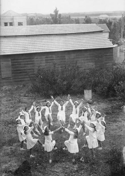 School girls dancing with their dance teacher on Tu B’Av in Hadera, Israel, between 1922 and 1948