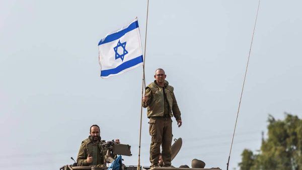 An Israeli soldier is seen on the Israel-Gaza border on October 9, 2023. (Photo by Ilia Yefimovich/picture alliance via Getty Images)