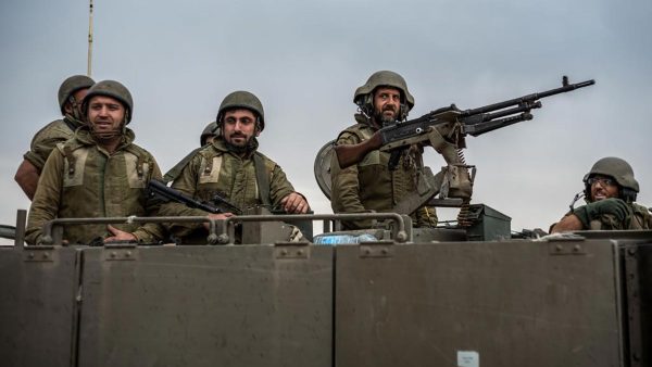 Israeli soldiers are seen in Sderot along the Gaza border on October 9, 2023. (Photo by Ilia Yefimovich/picture alliance via Getty Images)